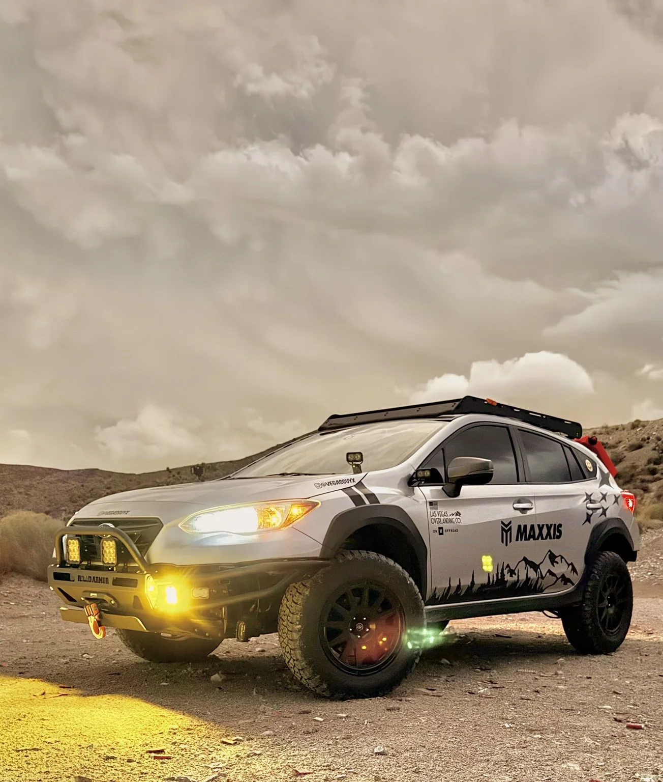 Astro in the desert with auxiliary lighting illuminated